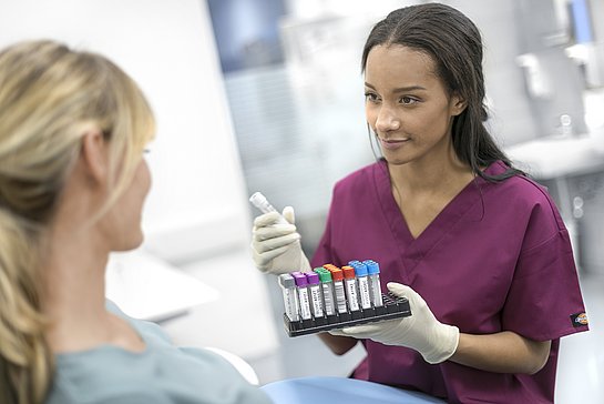 Preanalytics Image Nurse with Tubes. Greiner Bio-One Blog